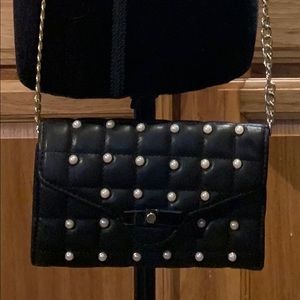 Stylish black pearl accents clutch